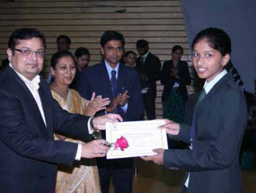 Hon. Milind Pradhan Rewarding University Topper (BCA) Ms. Neha Kumari